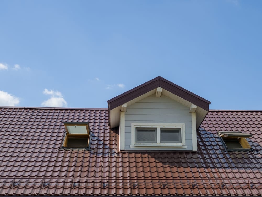 Rear dormer with two roof windows set into a clay-tiled Oxford roof