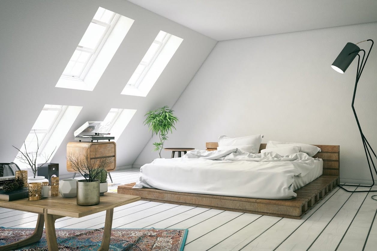 Visualisation of a Velux loft bedroom with four rooflights and timber flooring
