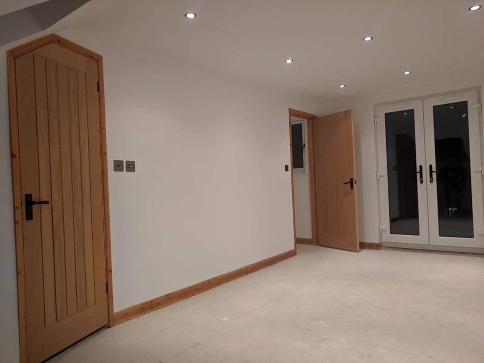 Completed loft room with oak doors and joinery in Oxford