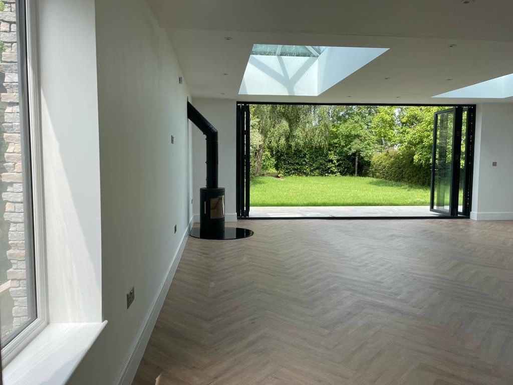 Rear extension with bifold doors and a roof lantern opening to an Oxford garden