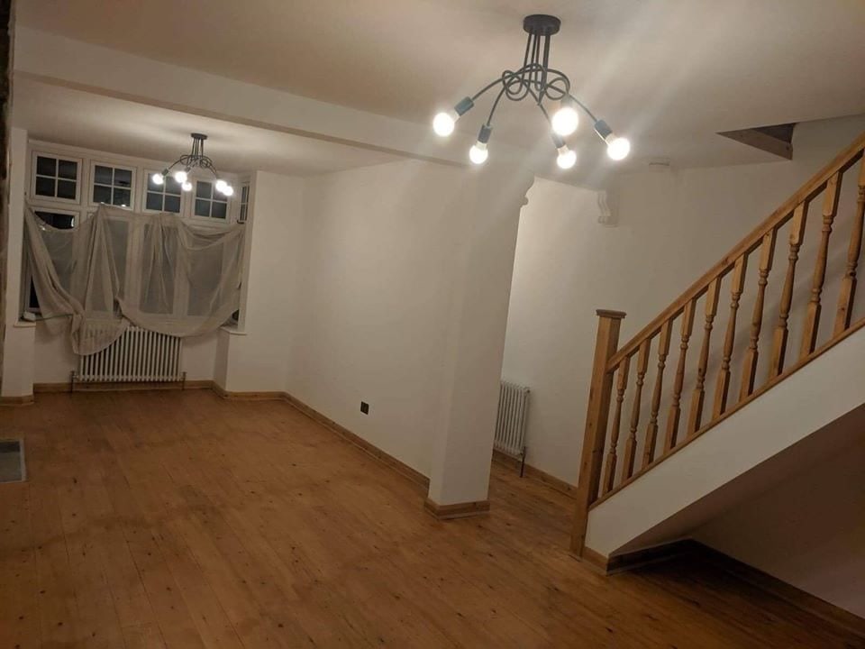 Renovated living room with new staircase in an Oxford house