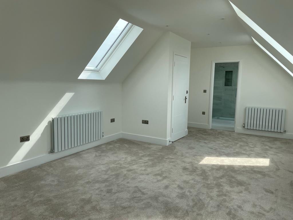 Loft room with a Velux rooflight and an ensuite shower room, Oxford